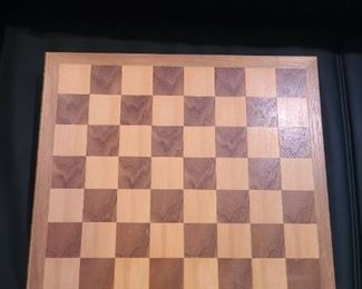 Chess board with hideaway pieces