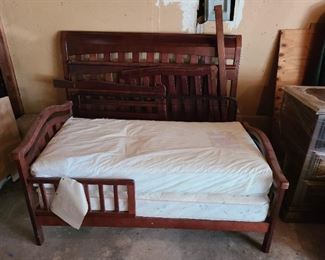 Solid wood baby bed that converts to toddler bed = all parts
