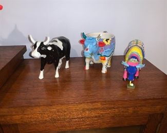 A very nice collection of all things cows!  Artwork, figurines and these cool cows too! Please view our prices at www.LoverAntiques.com.  Thank You!