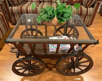 This is an original, primitive wheeled coffee table.   Questions?  Text us at 518-944-0256.  Please view our prices at www.LoverAntiques.com.  Thank You!