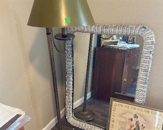 White wicker mirror, art, tall floor standing lamp with Green Metal shade