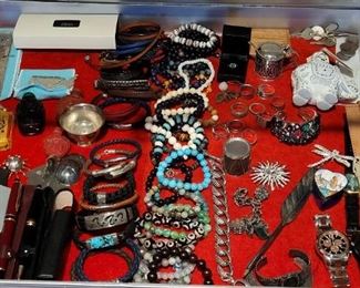 Nice selection of men's jewelry, including King Baby, John Hardy, David Yurman, and other assorted items.