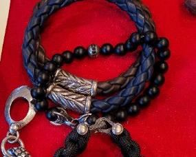 Several David Yurman sterling and leather bracelets