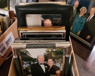 Great selection of small high end photo frames, many sterling!