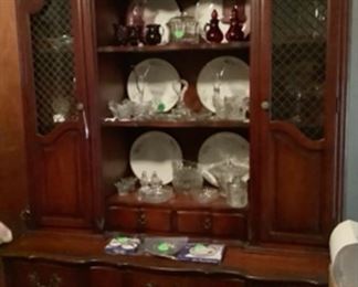 Beautiful French Provincial China cabinet with lots of storage and a built in desk with secret doors.  One beautiful unusual piece of furniture.