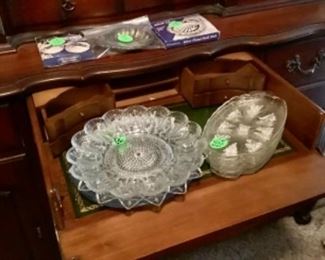 This shows the desk part of the China cabinet.