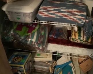 Just a few of the many hand crocheted shawls.