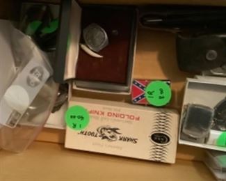 Some of the cigarette lighters and pocket knives.
