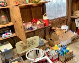 Thermo bottles, bottles, jars, household cleaning items.