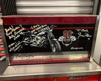 SnapOn too box signed by the Doobie Brothers Band and Gregg Allman from the Allman Brothers Band. We can not verify the signatures but were told that the owner of this merchandise worked on their bikes.