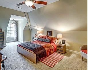 Ikea Queen Bed, Rolling Night Stand $225 for both and 6-Drawer Dresser Chest $85.  King Size Red Paisley Bedding with Chocolate Accents .  Wall Art $35 & Lamps $35ea  Trunk Style Side Table (on left) $85