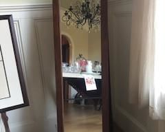 Free-Standing Ethan Allen Mirror  Note:  Missing one medallion on upper right