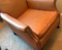 Antique Leather Horsehair Chair $175  Note damage on far right of back 