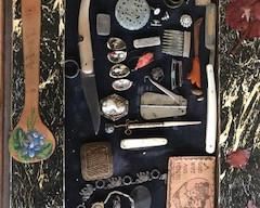 Items under glass in Trestle Table