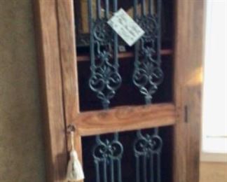 Wine Cabinet.  It holds 18 bottles of wines and also has a space for hanging wine glasses. Price is $340.00. This has SOLD to the New Home Owner.