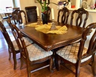 Beautiful Oblong Dining Table with 2 Leaves and 8 Chairs in Very Good Condition.  Price is $2000.00.