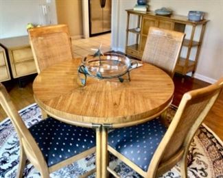 Mid-Century Round/Oval w/Leaf Dining Table with 6 Chairs Priced at $250.00.  Chair cushions need to be recovered.  Also, nice 8' Round Area Rug Priced at $60.00.