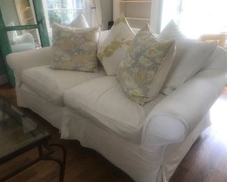 $325/650 Pair Carlisle Design "Shabby Chic" style slip cover sofa.  Length 7' x depth 42" x height 3'.  Excellent condition.  Print pillows $25 each  