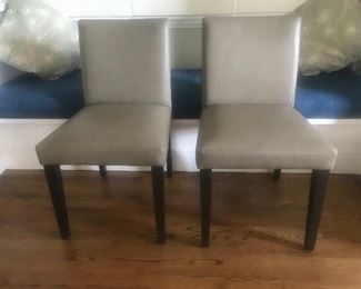 $300 Pair/$150 Each -- West Elm leather upholstered side chairs.  Excellent condition.  Height 33" x 21".  