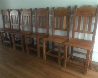 $850 -- Set of six antique, dowel/peg construction high back  dining chairs with concave seats.  Excellent condition.  Height 45".  