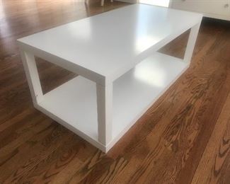 $65 -- Ikea white laminate two tier coffee table.  Good condition with minor wear.  Length 48" x width 24"x  height 18".  