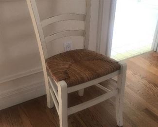$25 -- Small side chair with rush seat and white distressed finish.  Excellent condition.  