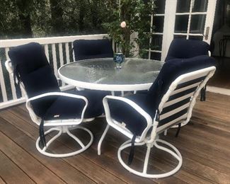 $165 -- Mallin patio set, table and four chairs with Gold Crest cushions.  Excellent condition with minor wear on chairs.  Table 48" diameter.  