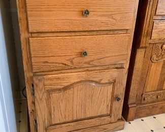 #16	Oak cabinet with 2 drawers and a door 21"x26"x38"	 $60.00 
