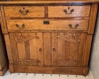 #15	Antique oak buffet sideboard with 3 drawers and 2 doors 45"x21"x44"	 $150.00 
