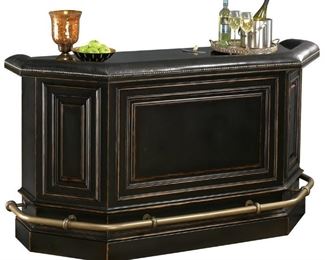 Howard Miller home bar (back view) - this is the real deal. Cutting boards, dovetail drawer openings, stemware holder, antique brass floor surround, marble top, leather elbow rests with nail rivet detail, condiment storage.... the list goes on. See next photos for more. 75"L x 28-1/2"D x 42"H Matching set of leather Northpoint Barstools in subsequent photos. BAR ONLY: $2500