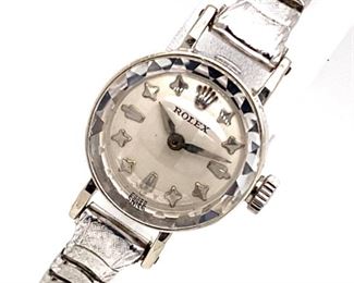 From famed watchmaker Rolex comes this vintage ladies watch made in pure 14k white gold.  The band is aftermarket and is stainless steel.  Weighs 12 grams gross.

Retail Estimate: $4100