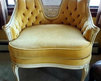 The other gold F P arm chair