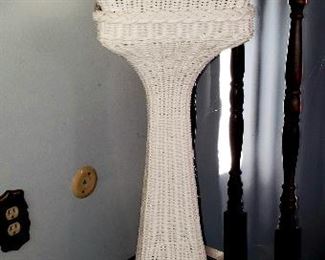 Two piece tall wicker plant stand