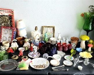 Table full of assorted collectibles