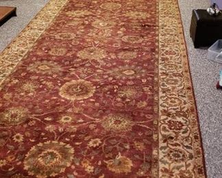 6' x 14 1/2' Rust color area rug