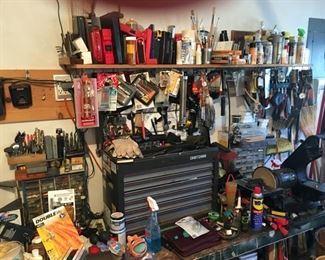 Tool bench loaded with toolbox,  tools and useful things!