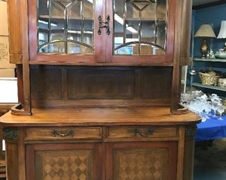 This is an amazing China Hutch/Buffet by Di Carico Furnitures.  Stamp on back. 7.5" tall. 1930's Leaded glass doors. Gorgeous oak.  One of a kind.