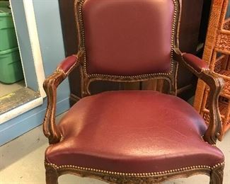 Beautiful 1940's style arm chair with carved frame, nail head and leather. Perfect office chair.