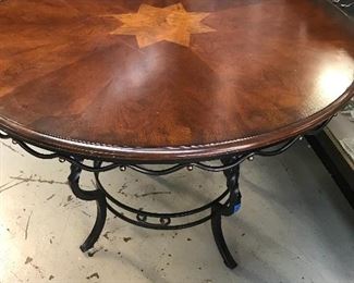 This wood and Iron table with 4 chairs is unique in its design.