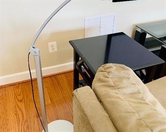 $40 - Ikea adjustable arm standing lamp.  48"H (as shown) x 11.5"D base