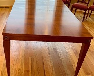 Detail - Ethan Allen Medallion Collection wood dining table with metal embellishments. 30"H x 42"D x 72"L (as shown). Two leaves available each measuring 18"L.  Total length with leaves inserted 108".