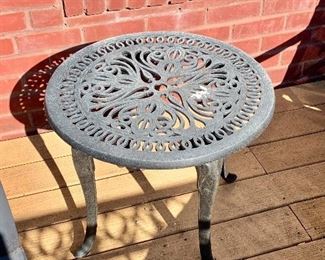 $40 - Round outdoor table; approx 20” D