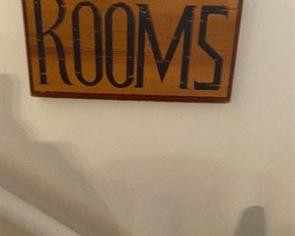 Wooden rooms sign