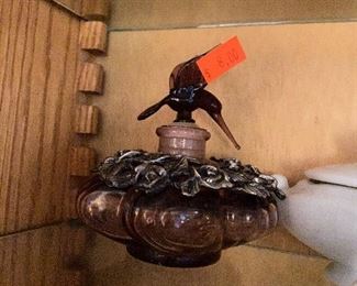 Purple glass with bird