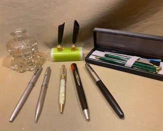 collectible pens and desk items