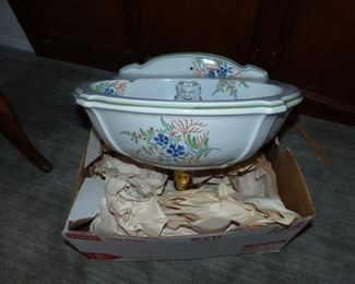 Hand painted bathroom sink with matching accessories
