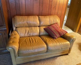 . . . a nice tan leather couch.