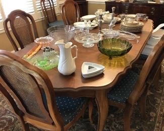 Bassett table with 6 chairs 