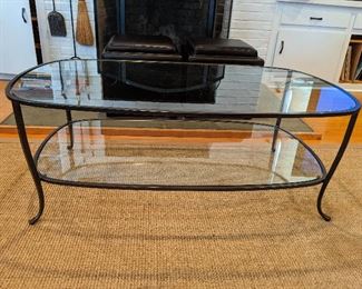 Nice wrought iron and glass one shelf coffee table.  $150