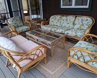 Six piece rattan patio set $450.  Sofa 79x36x31,pair of arm chairs 33.5 wide, loveseat 58.5x36x31, coffee table 48x24x18.5 and one end table 26.5x20x24